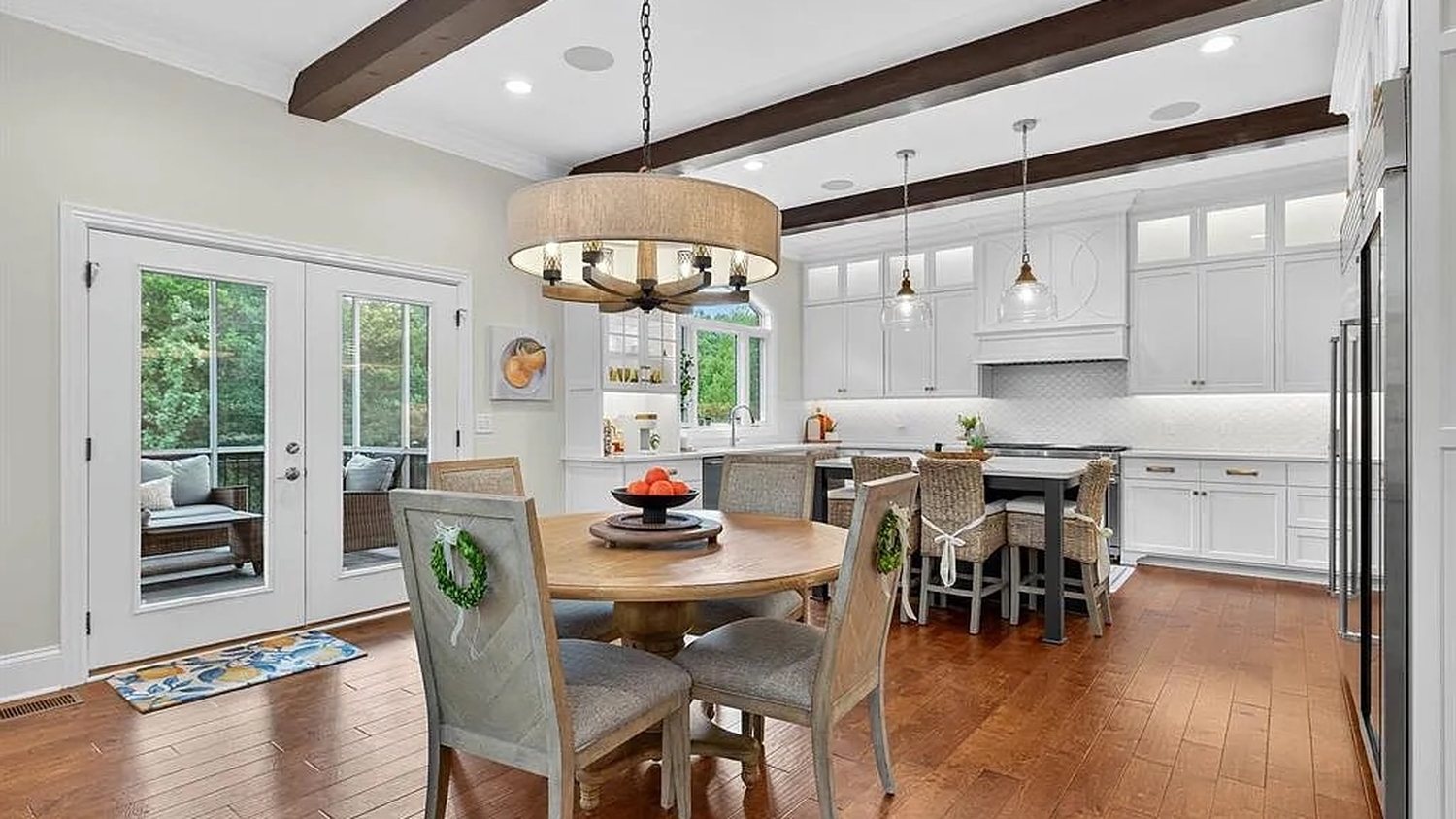 Open plan living and dining area before the Nelson Home & Company renovation