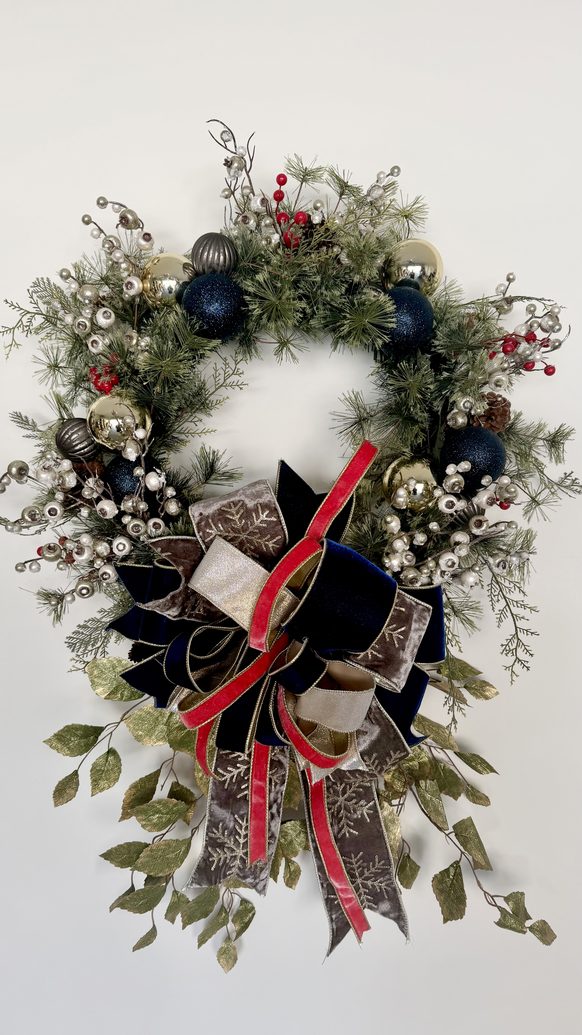 Christmas wreath in navy, silver and red with layered ribbon