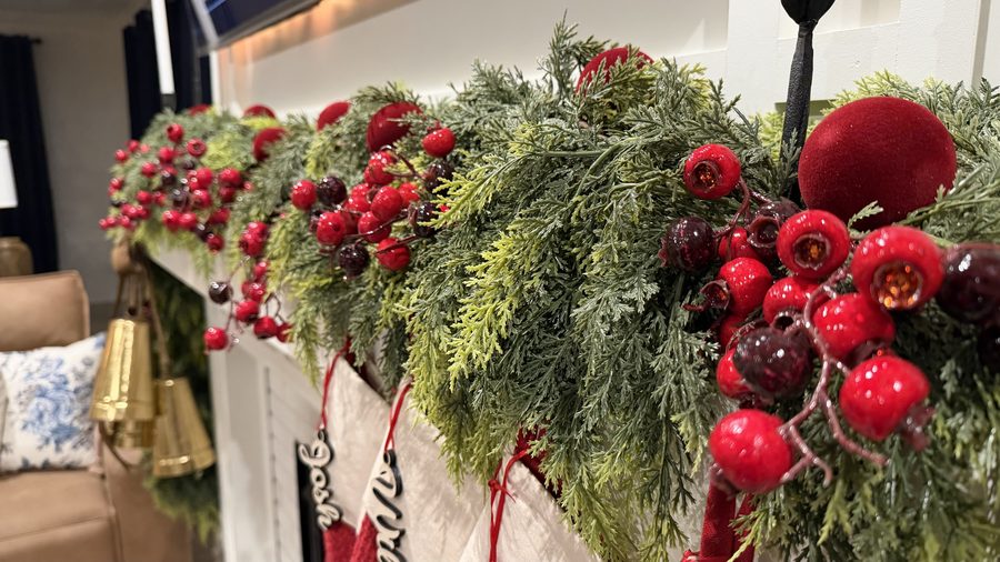 Christmas mantel garland with red berries, cedar and velvet ribbon